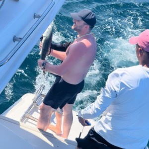 a person standing in front of water